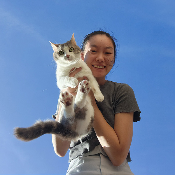 Girl holding a cat
